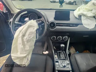 2019 Mazda CX-3 Touring z VIN JM1DKFC78K0414606, wystawiony jako Copart lot #56095515 z przebiegiem Nie podano mil oraz Szkoda całkowita • Salvage title. Historia ofert i sprzedaży dostępna na DreamBid. Obrazek 8.