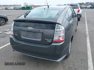 2007 Toyota Prius z VIN JTDKB20U073266399, wystawiony jako IAAI lot #41947176 z przebiegiem 186 258 mil mil oraz . Historia ofert i sprzedaży dostępna na DreamBid. Obrazek 4.