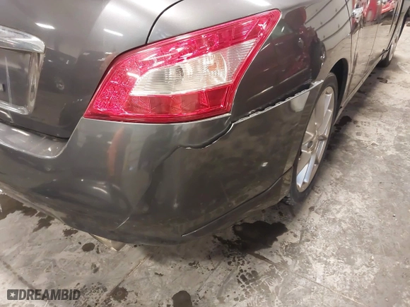 2010 Nissan Maxima 3.5 SV w/Premium Pkg with VIN 1N4AA5AP9AC806399, listed as a IAAI auction lot 41565520 with 147,531 mi miles. Bid and sale history available at carsss.com. Image 20.