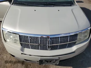 2007 Lincoln MKX z VIN 2LMDU88C07BJ26919, wystawiony jako Copart lot #55778005 z przebiegiem Nie podano mil oraz Szkoda całkowita • Salvage title. Historia ofert i sprzedaży dostępna na DreamBid. Obrazek 11.