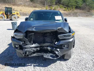 2023 Toyota Tacoma SR5 z VIN 3TMDZ5BN1PM163714, wystawiony jako IAAI lot #41814446 z przebiegiem 14 069 mil mil oraz . Historia ofert i sprzedaży dostępna na DreamBid. Obrazek 13.