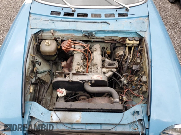 1974 FIAT 124 Spider z VIN 124CS10081683, wystawiony jako Copart lot #58650195 z przebiegiem 143 647 mil mil oraz Czysty tytuł • Clean title. Historia ofert i sprzedaży dostępna na DreamBid. Obrazek 11.