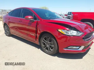 2018 Ford Fusion SE z VIN 3FA6P0LU7JR163207, wystawiony jako IAAI lot #42316620 z przebiegiem 59 608 mil mil oraz . Historia ofert i sprzedaży dostępna na DreamBid. Obrazek 1.