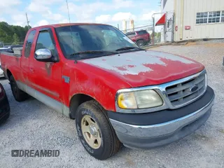 2002 Ford F-150 XL with VIN 1FTRX17W12NA07936, listed as a IAAI auction lot 42068598 with 1 mi miles. Bid and sale history available at carsss.com. Image 1.