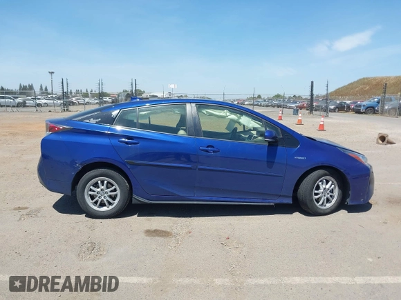 2017 Toyota Prius Two with VIN JTDKBRFUXH3044163, listed as a IAAI auction lot 42196278 with 117,610 mi miles and . Bid and sale history available at DreamBid. Image 13.