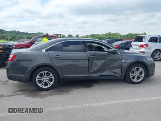 2015 Ford Taurus SEL with VIN 1FAHP2E83FG175051, listed as a IAAI auction lot 42357517 with 200,033 mi miles and . Bid and sale history available at DreamBid. Image 13.