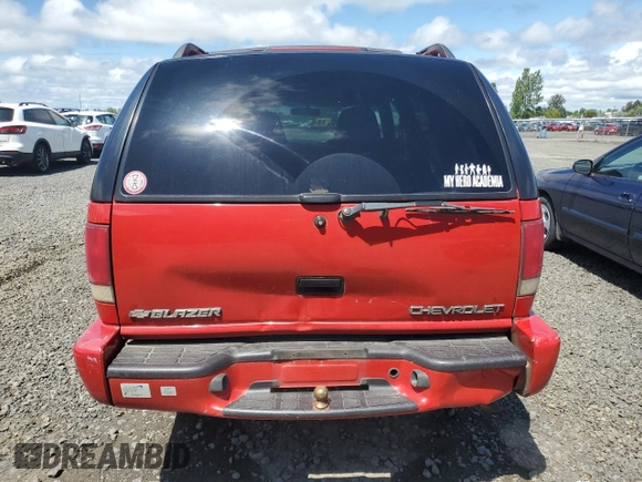 2000 Chevrolet Blazer LT z VIN 1GNDT13W8Y2392666, wystawiony jako Copart lot #56652895 z przebiegiem 223 924 mil mil oraz Szkoda całkowita • Salvage title. Historia ofert i sprzedaży dostępna na DreamBid. Obrazek 6.