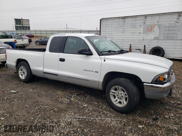 2001 Dodge Dakota Sport with VIN 1B7GL22N01S284441, listed as a Copart auction lot 83486504 with 114,613 mi miles and Salvage Title. Bid and sale history available at carsss.com. Image 4.