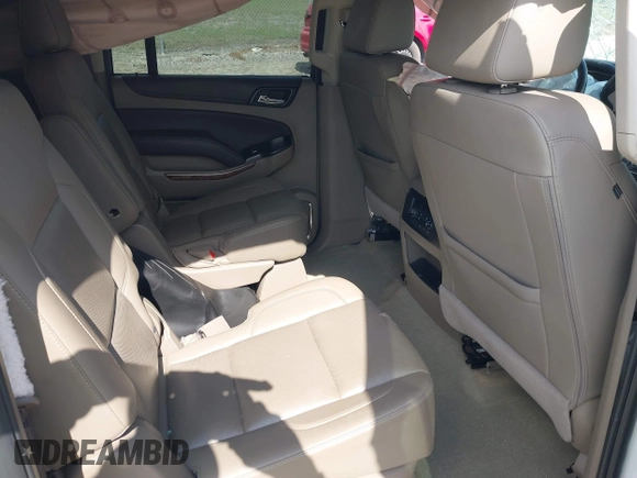 2017 Chevrolet Suburban Premier with VIN 1GNSKJKC0HR288648, listed as a IAAI auction lot 41579677 with Not Provided miles and . Bid and sale history available at DreamBid. Image 8.