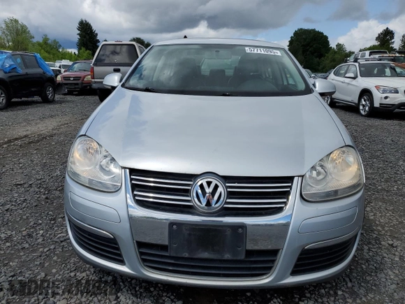2009 Volkswagen Jetta SE with VIN 3VWRM71K99M156016, listed as a Copart auction lot 57711095 with 206,869 mi miles and Clean title. Bid and sale history available at DreamBid. Image 5.