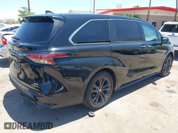 2021 Toyota Sienna XSE with VIN 5TDXRKEC6MS021909, listed as a IAAI auction lot 42432609 with 57,295 mi miles and . Bid and sale history available at DreamBid. Image 4.