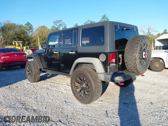 2015 Jeep Wrangler Unlimited Rubicon with VIN 1C4BJWFGXFL610153, listed as a IAAI auction lot 41575401 with 114,583 mi miles. Bid and sale history available at carsss.com. Image 3.