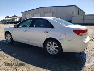 2012 Lincoln MKZ z VIN 3LNHL2GC3CR800619, wystawiony jako Copart lot #57872365 z przebiegiem 66 280 mil mil oraz Szkoda całkowita • Salvage title. Historia ofert i sprzedaży dostępna na DreamBid. Obrazek 2.
