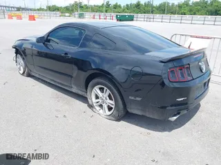 2014 Ford Mustang V6 with VIN 1ZVBP8AM3E5217165, listed as a IAAI auction lot 39801387 with 108,505 mi miles. Bid and sale history available at carsss.com. Image 3.