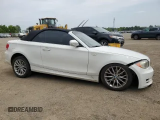 2012 BMW 1 Series 128i with VIN WBAUL7C52CVE87413, listed as a Copart auction lot 60557095 with 148,311 mi miles and Clean title. Bid and sale history available at DreamBid. Image 4.