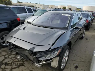 2020 Jaguar I-Pace SE z VIN SADHC2S10L1F83543, wystawiony jako Copart lot #78755163 z przebiegiem 18 792 mil mil oraz . Historia ofert i sprzedaży dostępna na DreamBid. Obrazek 1.