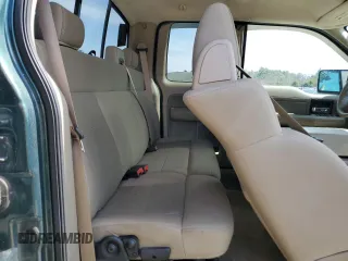 2007 Ford F-150 STX with VIN 1FTRX14W57FB39989, listed as a Copart auction lot 50695635 with 252,852 mi miles and Salvage title. Bid and sale history available at DreamBid. Image 10.
