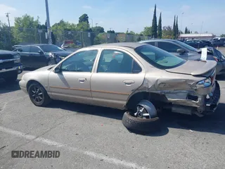 1999 Ford Contour z VIN 3FAFP66L6XM102099, wystawiony jako IAAI lot #42161889 z przebiegiem 100 340 mil mil oraz . Historia ofert i sprzedaży dostępna na DreamBid. Obrazek 14.