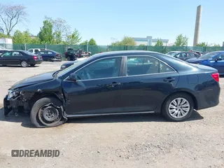 2012 Toyota Camry L with VIN 4T1BF1FK0CU599819, listed as a IAAI auction lot 42158719 with 130,038 mi miles. Bid and sale history available at carsss.com. Image 13.