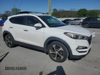 2016 Hyundai Tucson Limited with VIN KM8J33A2XGU117712, listed as a Copart auction lot 52489815 with 149,843 mi miles and Salvage Title. Bid and sale history available at carsss.com. Image 4.