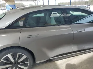 2022 Lucid Air Grand Touring z VIN 50EA1GBA1NA003034, wystawiony jako Copart lot #48893755 z przebiegiem Nie podano mil oraz Szkody całkowita. Historia ofert i sprzedaży dostępna na DreamBid. Obrazek 10.