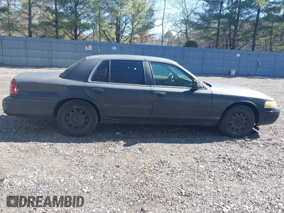 2011 Ford Crown Victoria with VIN 2FABP7AV9BX121739, listed as a IAAI auction lot 41763311 with 215,727 mi miles. Bid and sale history available at carsss.com. Image 13.