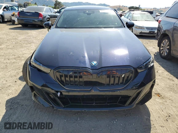 2024 BMW i5 eDrive40 with VIN WBY33FK03RCS14771, listed as a Copart auction lot 62393255 with 25,192 mi miles and Salvage title. Bid and sale history available at DreamBid. Image 5.