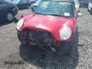 2006 MINI Convertible z VIN WMWRF33546TG13986, wystawiony jako IAAI lot #42634138 z przebiegiem Nie podano mil oraz . Historia ofert i sprzedaży dostępna na DreamBid. Obrazek 6.