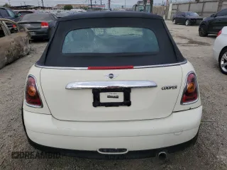 2010 MINI Convertible with VIN WMWMR3C52ATU96951, listed as a Copart auction lot 82038804 with 120,199 mi miles and Clean Title. Bid and sale history available at DreamBid. Image 6.