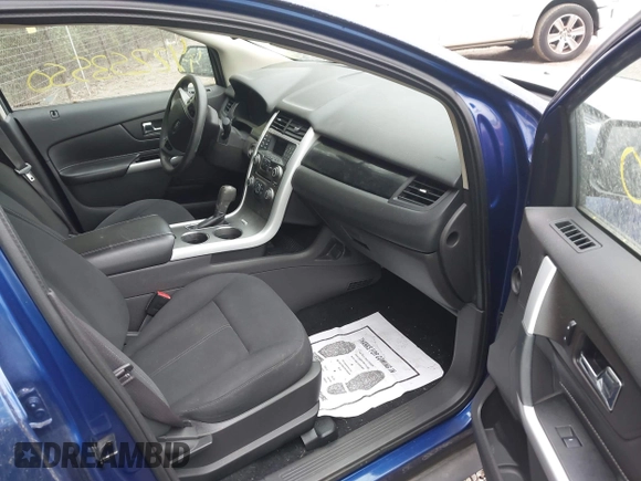 2014 Ford Edge SE z VIN 2FMDK3G93EBA15837, wystawiony jako IAAI lot #42253550 z przebiegiem 135 912 mil mil oraz . Historia ofert i sprzedaży dostępna na DreamBid. Obrazek 5.