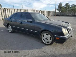 1997 Mercedes-Benz E-Class with VIN WDBJF72F8VA204316, listed as a Copart auction lot 84684614 with 203,748 mi miles and Salvage Title. Bid and sale history available at carsss.com. Image 4.