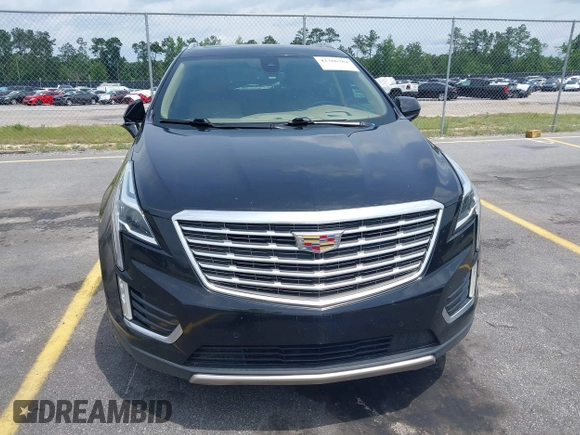 2017 Cadillac XT5 Platinum AWD z VIN 1GYKNFRS9HZ125677, wystawiony jako IAAI lot #42366784 z przebiegiem 152 116 mil mil oraz . Historia ofert i sprzedaży dostępna na DreamBid. Obrazek 13.