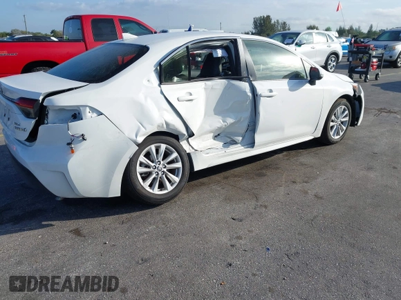 2024 Toyota Corolla Hybrid LE with VIN JTDBCMFE2RJ031865, listed as a IAAI auction lot 41602715 with 10,892 mi miles. Bid and sale history available at carsss.com. Image 4.