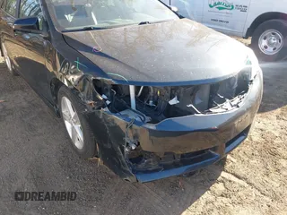 2012 Toyota Camry L with VIN 4T1BF1FK3CU039163, listed as a IAAI auction lot 41822537 with 166,869 mi miles and . Bid and sale history available at carsss.com. Image 6.
