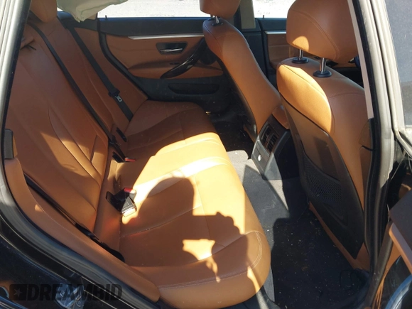 2015 BMW 4 Series 428i with VIN WBA4A5C51FG051393, listed as a IAAI auction lot 42041960 with 136,929 mi miles and . Bid and sale history available at carsss.com. Image 8.