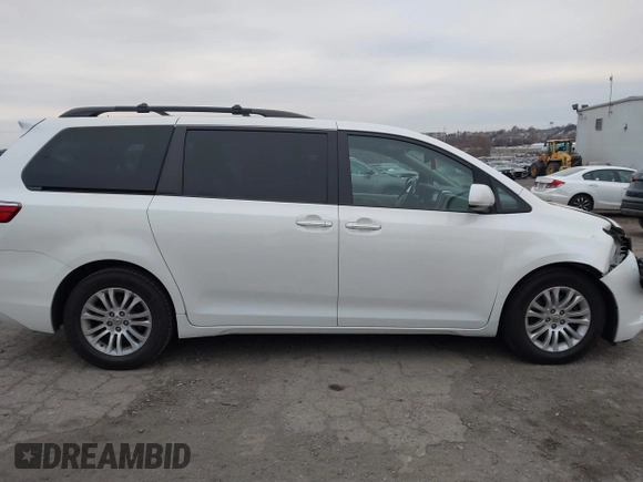 2015 Toyota Sienna XLE with VIN 5TDYK3DC9FS595827, listed as a IAAI auction lot 41014820 with 119,143 mi miles. Bid and sale history available at carsss.com. Image 13.
