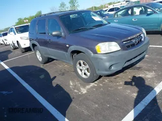 2006 Mazda Tribute i with VIN 4F2YZ02Z86KM34829, listed as a IAAI auction lot 41999433 with 178,165 mi miles and . Bid and sale history available at carsss.com. Image 1.