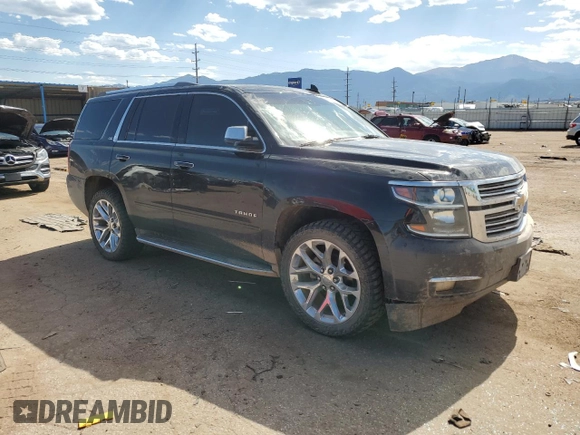 2016 Chevrolet Tahoe LTZ with VIN 1GNSKCKC6GR470137, listed as a Copart auction lot 61127585 with 134,015 mi miles and Clean title. Bid and sale history available at DreamBid. Image 4.
