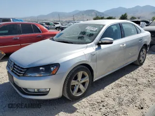 2015 Volkswagen Passat Wolfsburg Edition with VIN 1VWAS7A36FC110135, listed as a Copart auction lot 61097945 with 111,284 mi miles and Salvage title. Bid and sale history available at DreamBid. Image 1.