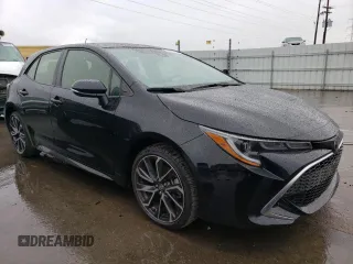 2021 Toyota Corolla Hatchback XSE with VIN JTNA4MBE9M3141562, listed as a Copart auction lot 67001604 with 33,233 mi miles and Salvage Title. Bid and sale history available at carsss.com. Image 4.