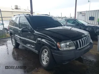 2004 Jeep Grand Cherokee Laredo z VIN 1J4GX48N94C435700, wystawiony jako IAAI lot #41809624 z przebiegiem 147 413 mil mil oraz . Historia ofert i sprzedaży dostępna na DreamBid. Obrazek 1.