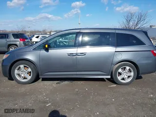 2013 Honda Odyssey Touring with VIN 5FNRL5H97DB018839, listed as a IAAI auction lot 41884016 with 171,650 mi miles. Bid and sale history available at carsss.com. Image 14.