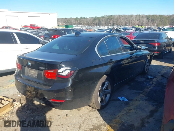 2015 BMW 3 Series 328i with VIN WBA3A5G54FNP34500, listed as a IAAI auction lot 41695866 with 168,000 mi miles and . Bid and sale history available at carsss.com. Image 4.