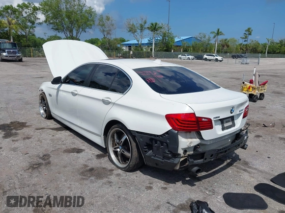 2014 BMW 5 Series 535i xDrive with VIN WBA5B3C56ED536747, listed as a IAAI auction lot 41900220 with 132,757 mi miles and . Bid and sale history available at carsss.com. Image 3.