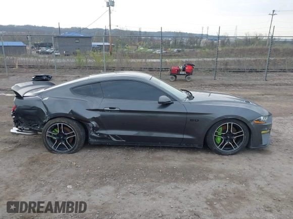 2018 Ford Mustang GT z VIN 1FA6P8CF9J5179766, wystawiony jako IAAI lot #41977000 z przebiegiem 83 608 mil mil oraz . Historia ofert i sprzedaży dostępna na DreamBid. Obrazek 14.