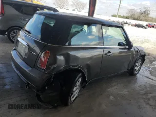 2006 MINI Hardtop with VIN WMWRC33526TK15620, listed as a Copart auction lot 54130715 with 116,981 mi miles and Salvage title. Bid and sale history available at DreamBid. Image 3.