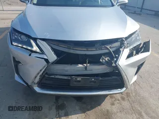 2016 Lexus RX 350 z VIN 2T2ZZMCA3GC005603, wystawiony jako IAAI lot #42492879 z przebiegiem 122 778 mil mil oraz . Historia ofert i sprzedaży dostępna na DreamBid. Obrazek 6.