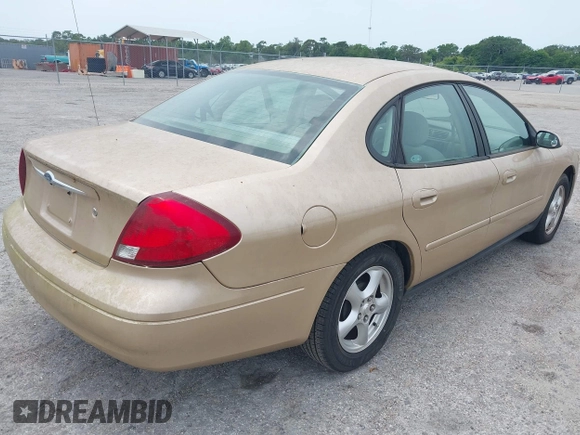 2003 Ford Taurus SES Standard with VIN 1FAFP55213A225447, listed as a IAAI auction lot 42206073 with 177,163 mi miles. Bid and sale history available at carsss.com. Image 4.