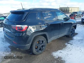 2019 Jeep Compass Latitude with VIN 3C4NJDBB9KT794074, listed as a IAAI auction lot 41068687 with 106,947 mi miles and . Bid and sale history available at DreamBid. Image 4.