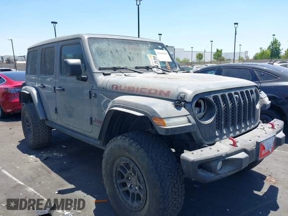 2023 Jeep Wrangler Rubicon with VIN 1C4JJXFG7PW541813, listed as a IAAI auction lot 42640045 with 53,645 mi miles and . Bid and sale history available at DreamBid. Image 1.